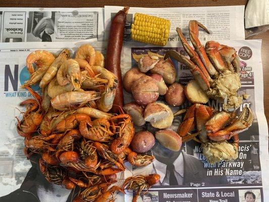 1 lb each of shrimp, crawfish, crab, potatoes & then sausage & corn