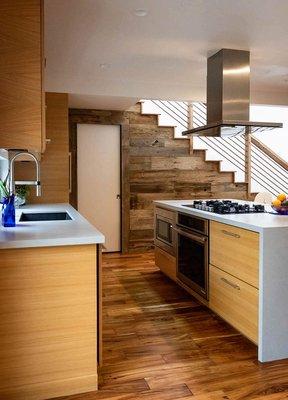 Our integrated reclaimed oak wood as a back drop to our the kitchen in our Ocean view, Encinitas home build project.