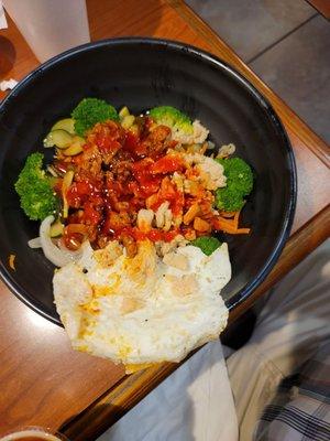 Low Carb Two Meat Bowl: Spicy pork & egg(runny in center), broccoli, cabbage, onion, carrots, squash. W/spicy bollggogi sauce.