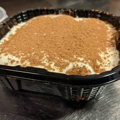 Classic Tiramisu. Ladyfingers, espresso, brandy and cocoa, layered with whipped mascarpone.