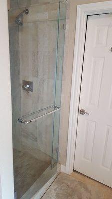 Glass shower door installed by McCauley