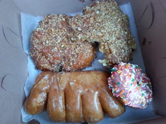 Bear claw, crumb apple fritters, and a pink sprinkle. YUM!