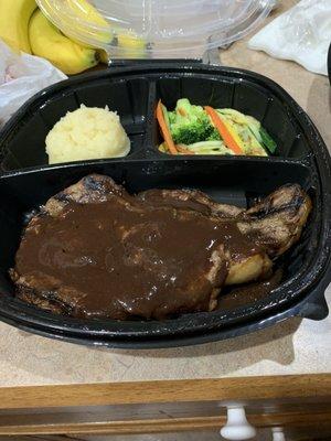 Grilled ribeye with Yukon Gold mashed potatoes and steamed vegetables.