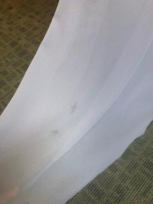 More stains on the bottom of the dress that occurred during the alteration process