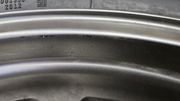 Major scratches down to the metal, created by RMS on tire mounting machine.