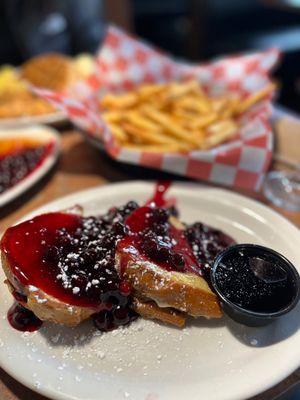 Stuffed french toast with huckleberry Side of fries