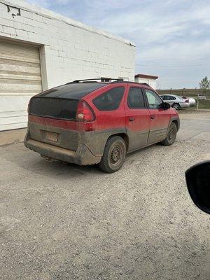 Cream puff Pontiac Aztec