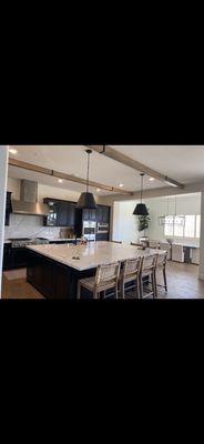 After, brand new quartz counter tops and quartz slab backsplash from Garcia granite