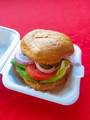 Our Kind Chkn Sandwich is fried to perfection and served with lettuce, tomato, onion, pickle and vegan mayo!