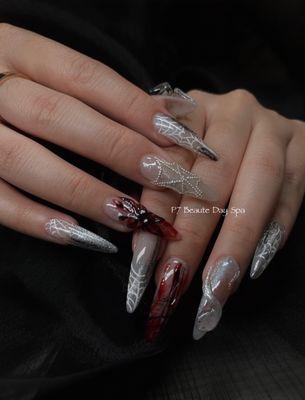 Scary nails with 3D designs. #halloweennails #spiderwebnails #nailart #nailsdesigns #buildergel #geloverlay #gelx #mani #p7beautedayspa