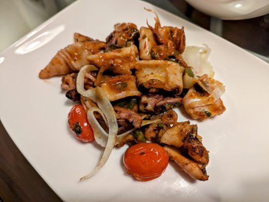 The recipe for the grilled calamari has changed. This one is prepared with fennel, olives, and tomatoes. Very good.