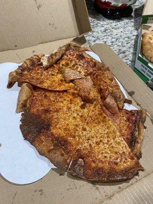 Burnt and dropped pizza