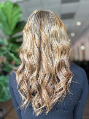 Melting Caramel blonde Highlights on midtoned blonde hair.