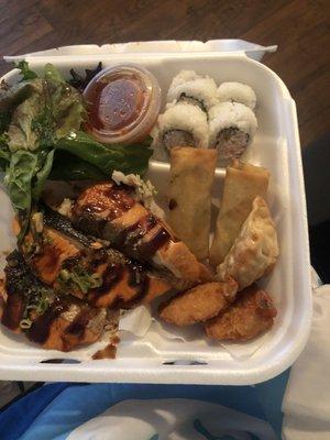 2 Fish & Shrimp Combo Box 1 w. Salmon over rice, a side of salad, 2 spring rolls, 2 fried shrimp, 4 sushi rolls, & 2 fried dumplings.