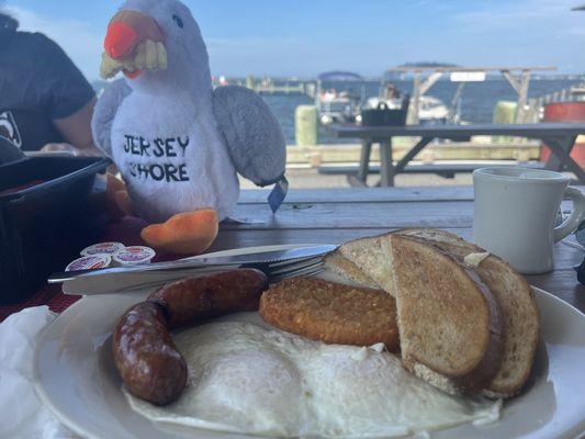 Basic 2 eggs over easy rye toast hash brown and thick sausage. Excellent every time.