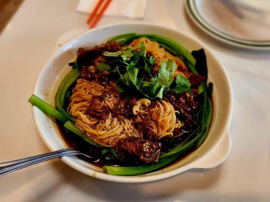 Stewed Brisket of Beef over noodles