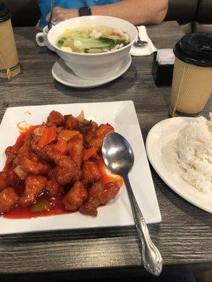 Sweet-and-sour chicken was delicious. The wonton soup in the background is a large serving.