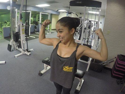 Carmen showing off that physique with her double front bicep pose!