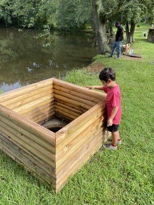 Making a wish of the wishing well