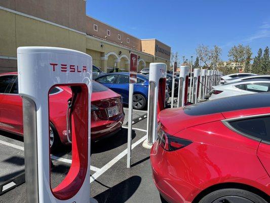 The cars on the left side are using up the chargers wrong. They're supposed to be for the right side only. Very easy to misinterpret.