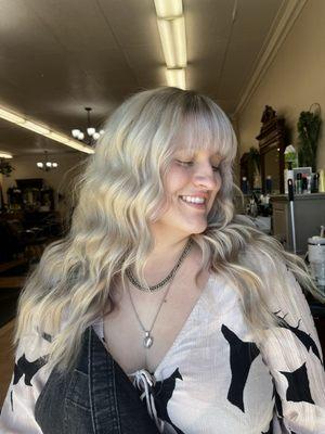 Bright blonde with lavender peek a boos done by Alissa Madrid