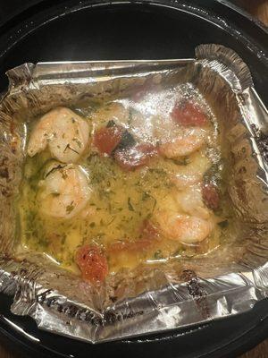 Scampi Shrimp in a butter sauce.