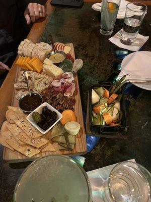 Amazing charcuterie with extra pickles, cheese curds, and delicious drinks