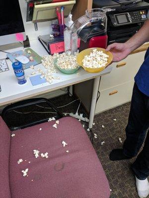 One does not simply eat popcorn without spilling some