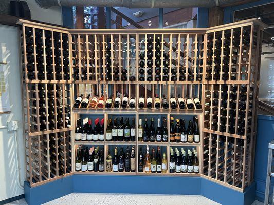 Wine shop filled with a variety of affordable local and international wines.