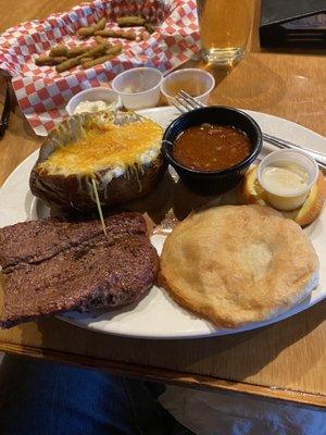 The Dude 8 ounce Sirloin, loaded baked potato, & fried green beans as an appetizer.