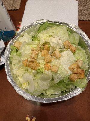 The Caesar salad was just iceberg lettuce with croutons on it. And the Caesar salad salad dressing was just oil