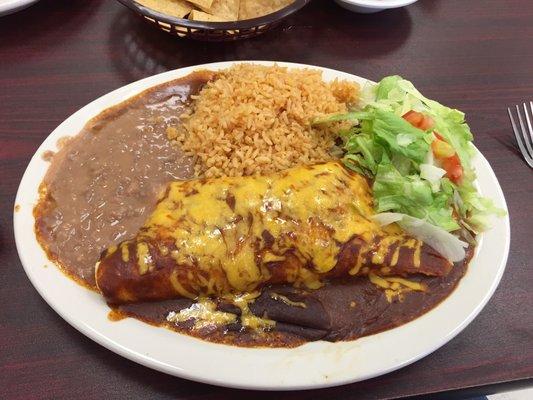 1 chicken enchilada in a flour tortilla with rice & beans. HUGE