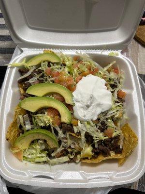 Nachos with steak and everything on it!