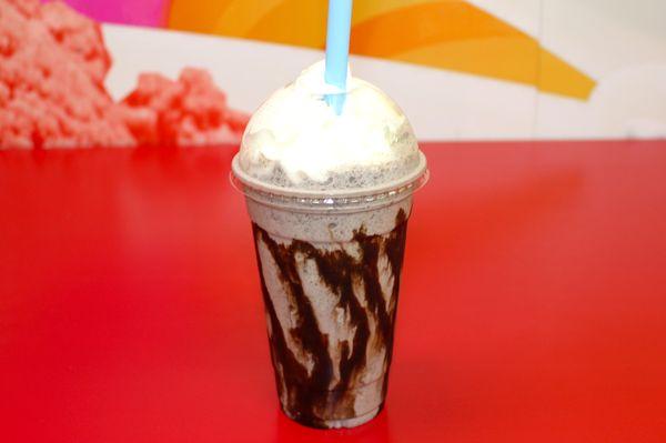 Chocolate Milkshake with chocolate syrup and topped with whipped cream!