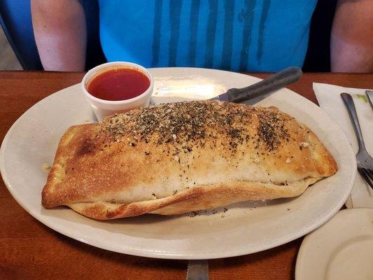 Bellybuster Stromboli the size of a platter!