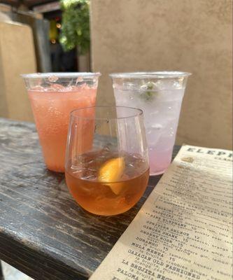 Trio of cocktails - Paloma (left), Oaxacan Old Fashioned (center), Pink Elephant (right)