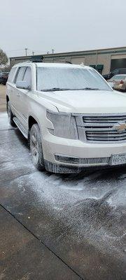 Customer vehicle getting cleaned after repair.