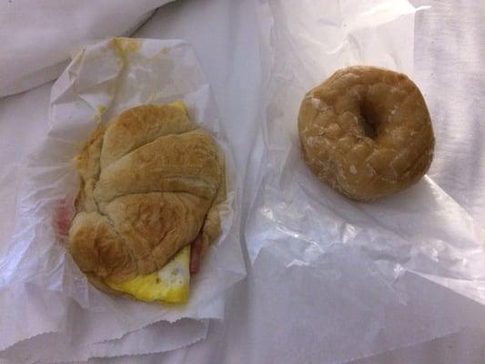 Egg and cheese croissant with glazed donut.