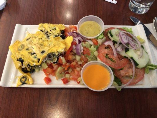 Greek omelet with salad and Israeli salad sub for fries