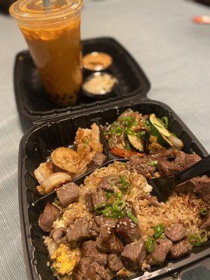 Steak and shrimp combo plate with fried rice and Thai Tea Boba.