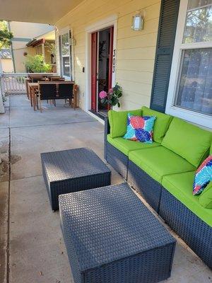 Lower outdoor lounge area breakfast tables