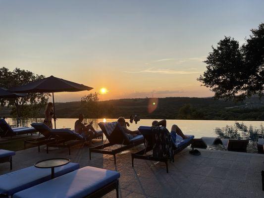 View of the sunset over the hill country from the adult only pool