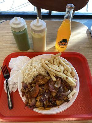 Pollo Saltado with white rice and steak fries