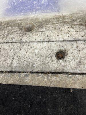 Floor at the ice entrance showing cement.  Not good for blades if you step onto the area.