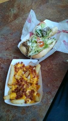 Bacon cheese fries..and philly cheese steak sub