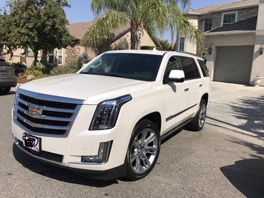 2016 Cadillac Escalade looking great after removing hard water spots & adding a layer of wax to protect & shine the paint