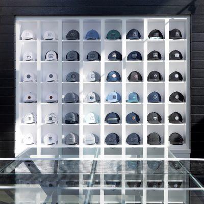 TravisMathew Hat Wall