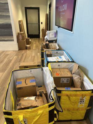 Many un-organized packages on the 1st floor, good luck sifting through to find yours.