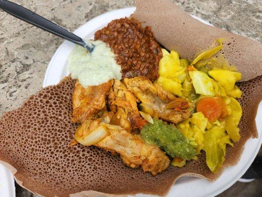 Chicken combo - mixed veggies, red stewed lentils, garlic lemon chicken & injera flatbread