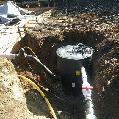 New installation of sewage ejector pump and drain system